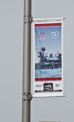 Union Pacific Arlington Heights.  Avenue banner announcing an anniversary.