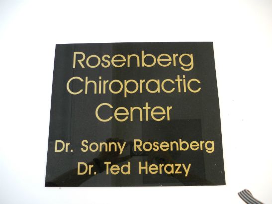 Rosenberg Chiropractic Center.  Acrylic sign with custom vinyl lettering. 