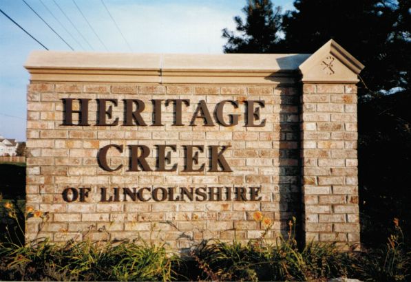 Heritage Creek Lincolnshire. Dimensional bronze letters, stud mounted in brick. 