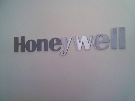Honeywell.  Dimensional acrylic logo with brushed silver metal laminate face.