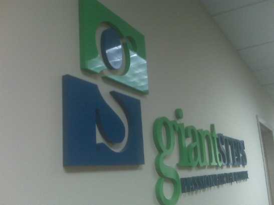 Giant Steps.  Dimensional logo and lettering in acrylic.