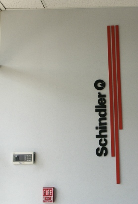 Schnider. Dimensional acrylic logo and name in receptionist area.  